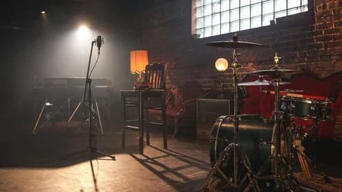 Music production setup with instruments and mixing board for genre blending